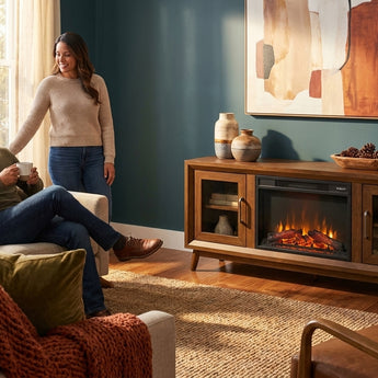 Elements International Santa Barbara - 60" TV Console in Walnut w/23" Fireplace Insert styled in a designer-styled interior lifestyle setting at Quality Home Furniture