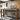 Torjin - 3 Pc. - Long Counter Table, 2 Stools - Dark Brown