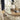 Realyn - Chipped White - Oval Dining Room Extension Table
