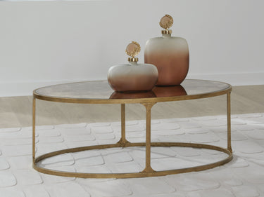 Korajane - Oval Cocktail Table - Antique Gold