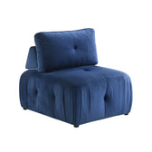 Nahla modular armless chair in dark blue velvet, angled view with tufted seat and back cushion