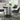 Centiar - Black / Gray - 5 Pc. - Counter Table, 4 Upholstered Barstools