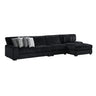 Nightfall 3-piece sectional in black ribbed fabric with right chaise, angled view, gray and patterned accent pillows