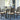 Rokane - Dining Room Table Set (Set of 7) - Brown
