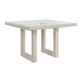 Avalanche square counter table in antique white, angled view showing glass top insert and double U-shaped base