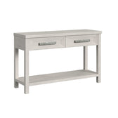 Avalanche sofa table in Antique White, angled view showing two drawers with textured handles and open lower shelf