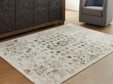 Jossler - 5' x 7' Rug - Ivory / Brown / Teal