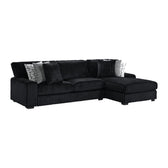 Nightfall 2-piece sectional in black Grand Cord, angled view with right-facing chaise and accent pillows