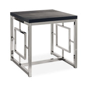 Ezra square end table with chrome frame, geometric side panels and black top, angled view