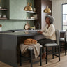Elements International Portland - Round Back Counter Stool with Grey Fabric styled in a designer-styled interior lifestyle setting at Quality Home Furniture