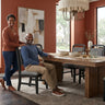 Elements International Ridgemont - Dining Side Chair with Grey Fabric styled in a designer-styled interior lifestyle setting at Quality Home Furniture
