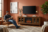 Elements International Santa Barbara - 70" TV Console in Walnut w/23" Fireplace Insert styled in a designer-styled interior lifestyle setting at Quality Home Furniture