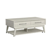 Westland coffee table with casters in Almond, angled view showing two drawers, silver handles and open shelf