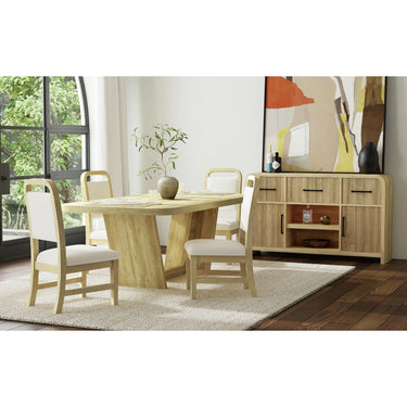 Ridgemont natural dining table with four white upholstered chairs on a rug in a sunlit dining room