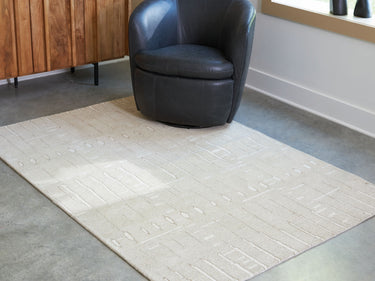 Wolbert - 5' x 7' Rug - Tan / Ivory