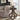 Tinley Park - Mesa auxiliar redonda decorativa - Gris cola de paloma